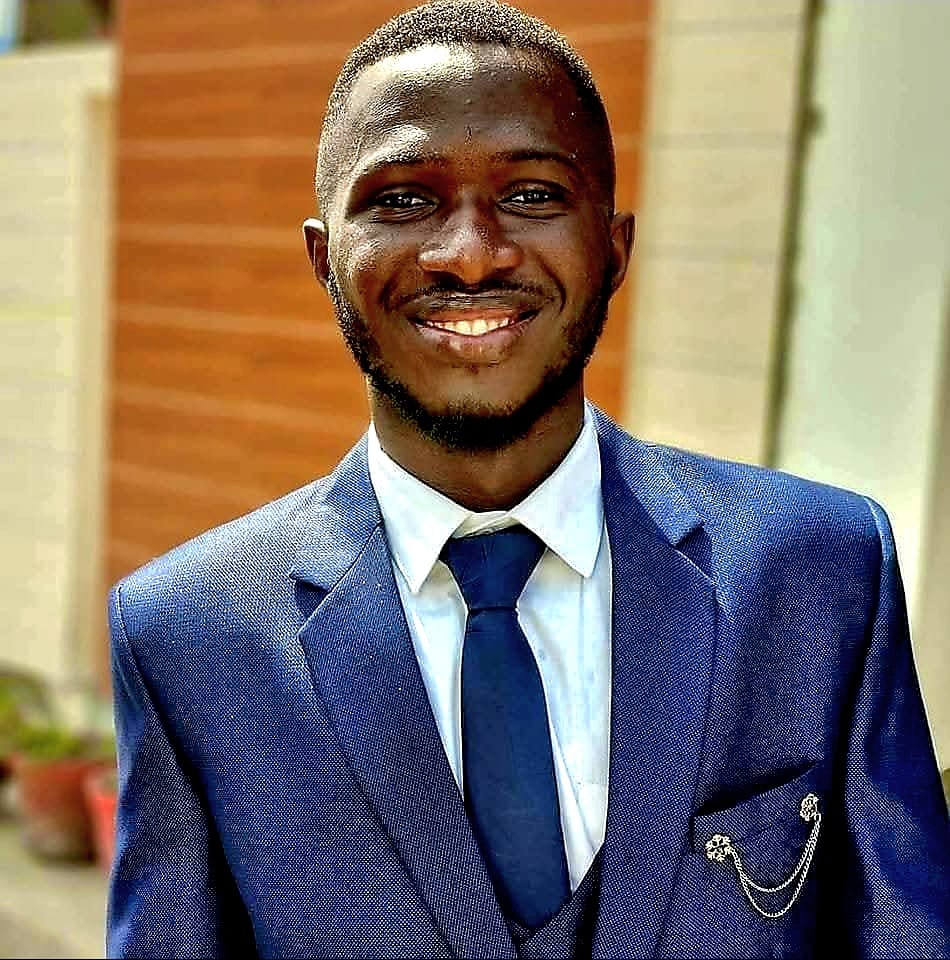 Professional headshot with studio background